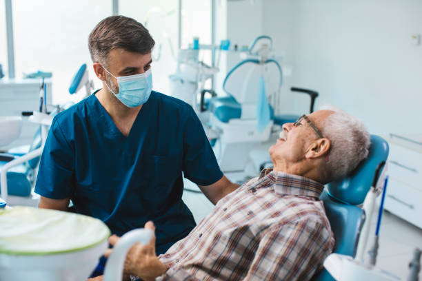 Dentist with his patient