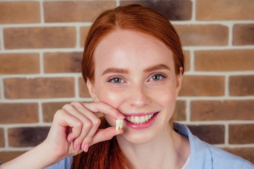 Girl with tooth