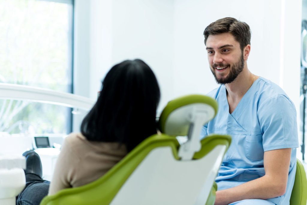 Dentist pays attention to his patient