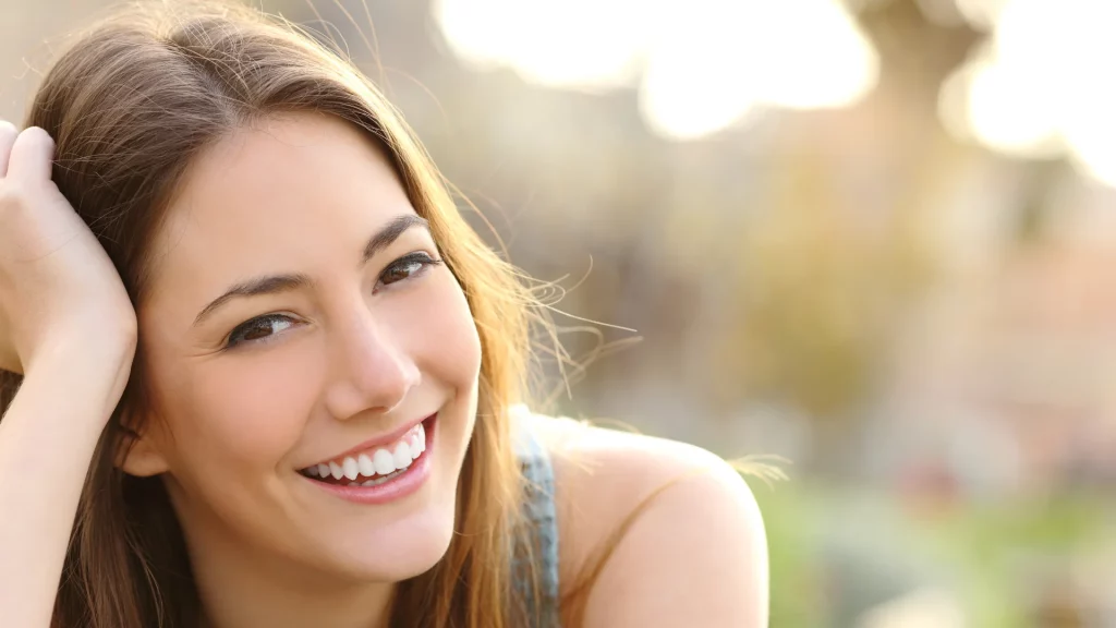 The girl smiles with delight